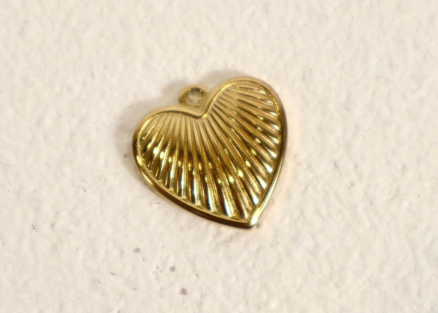 Gold heart charm