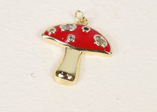 Gold and red mushroom charm