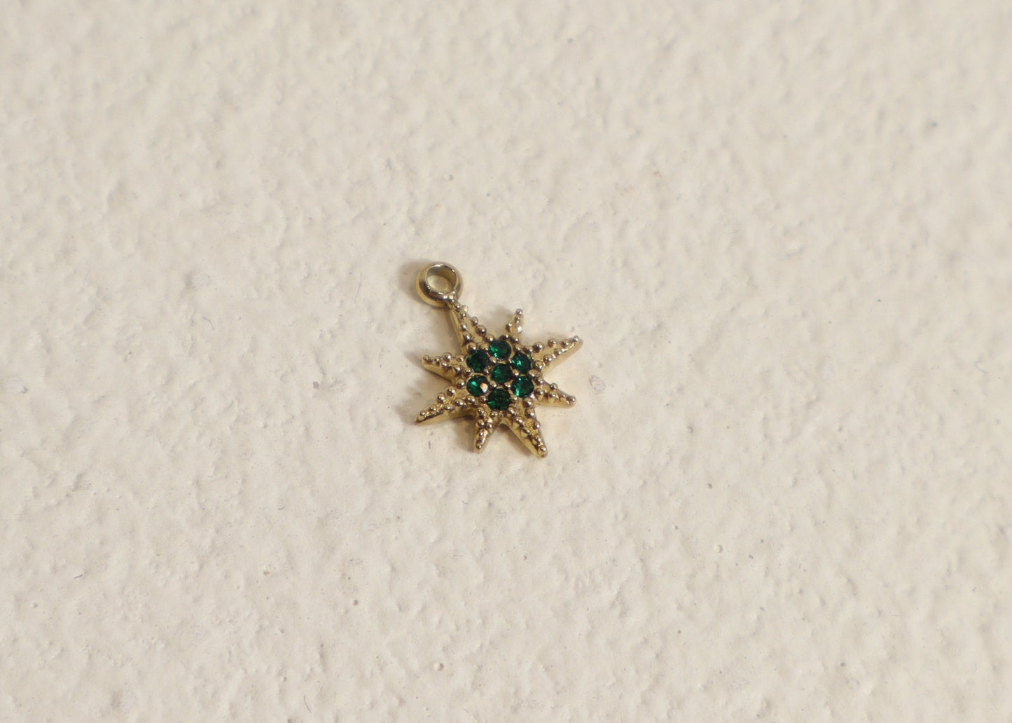 Green diamanté star charm gold